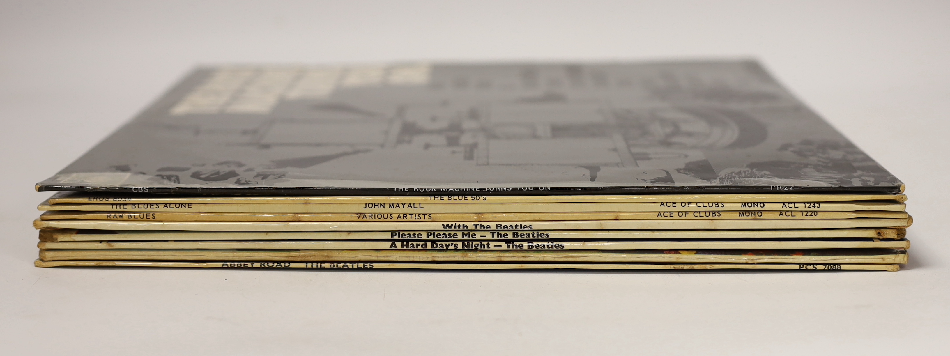 Nine LPs; including five by The Beatles; Abbey Road, Sgt. Pepper, A Hard Days Night, Please Please Me, With The Beatles, plus John Mayall; The Blues Alone, etc.